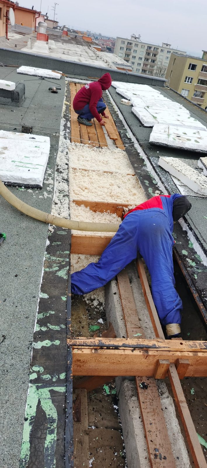 Zateplování ploché střechy bytového domu